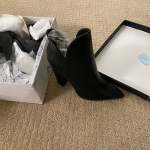 Black booties - never been worn. Still in box .